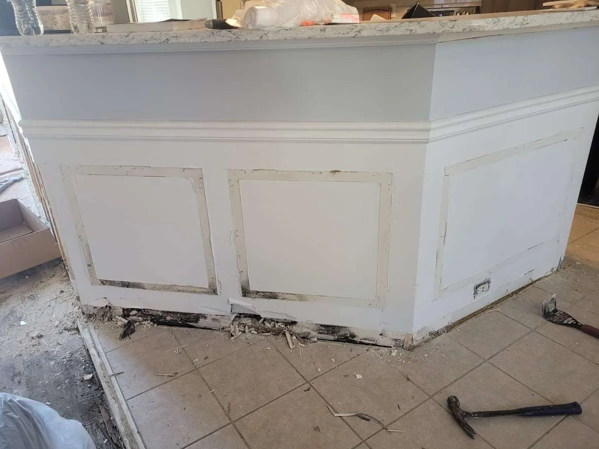 Water damage and mold on kitchen during Storm Damage Restoration in Jeannette